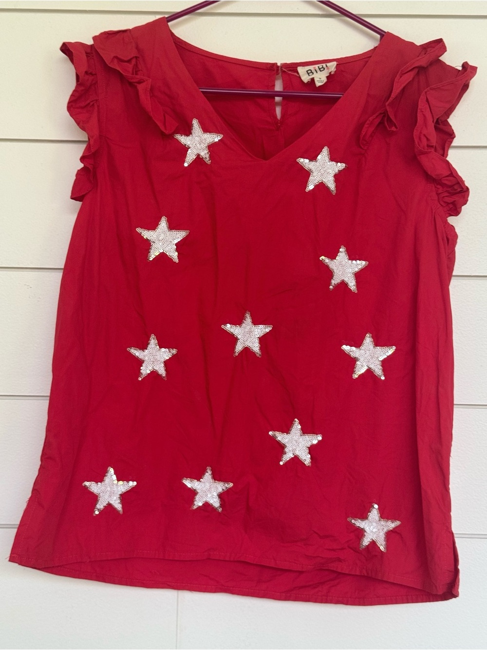 BiBi Red Sleeveless Ruffle Top with Silver Sequin Stars